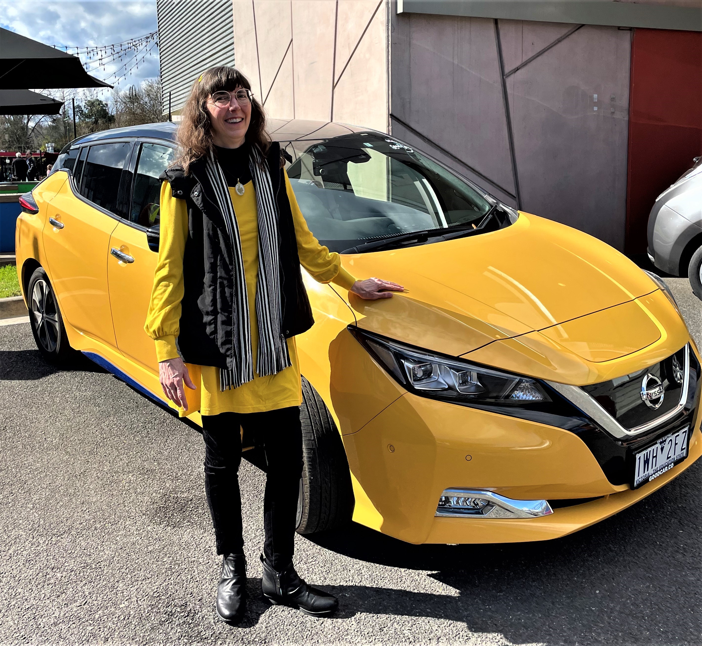 Katherine and yellow Nissan Leaf-2